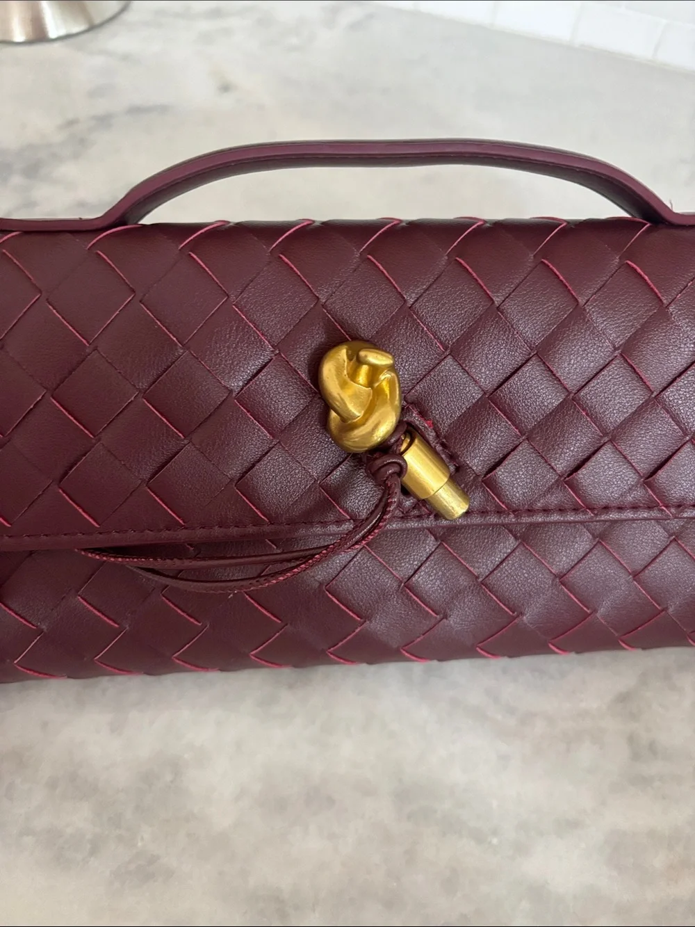 Woven  Burgundy Clutch with Gold Accent